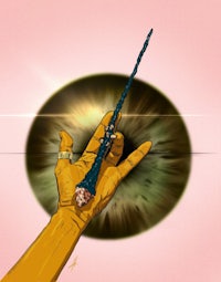a hand holding a wand in front of an eye